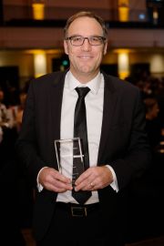 Photo of Jeremy Ford with award