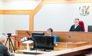Judge Bill Hastings presides over a case in the Wellington District Court