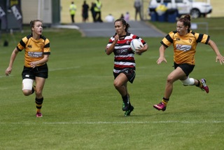 Azania Watene playing rugby